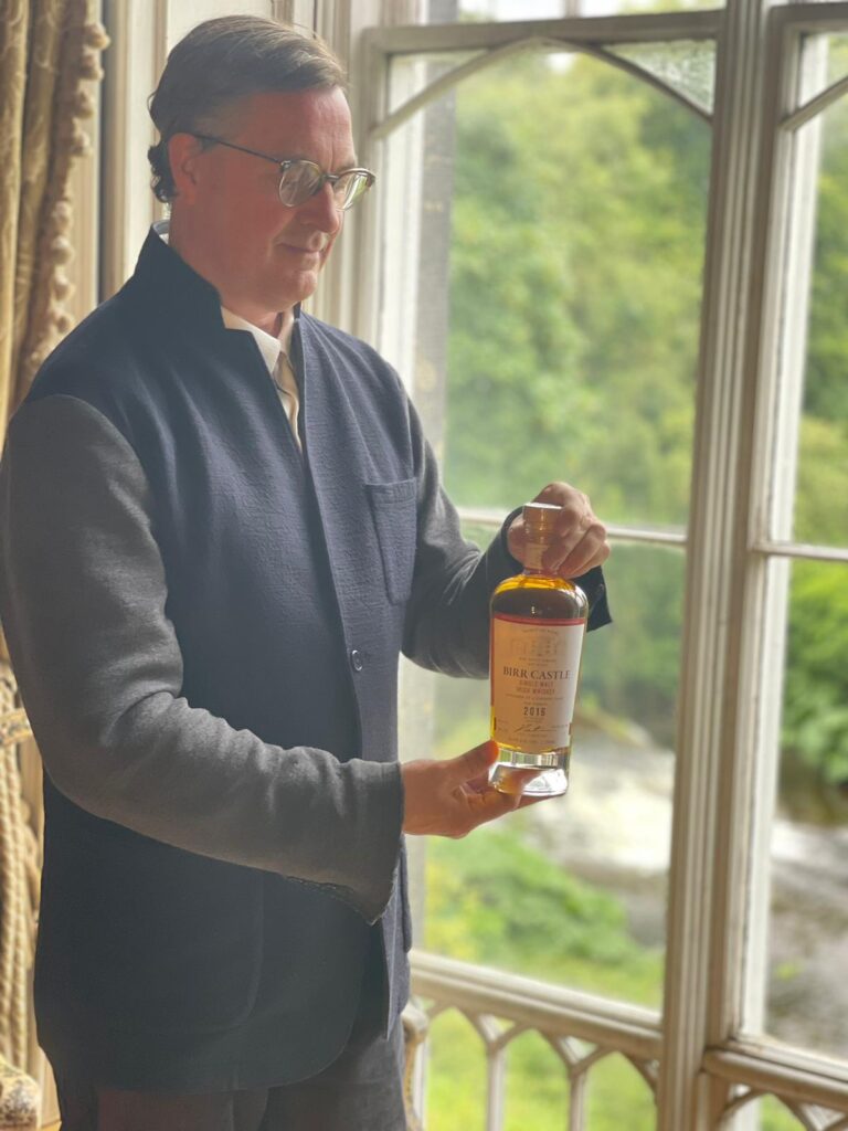 Patrick Parsons Holding Birr Castle Whiskey